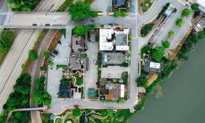 Elevation certificate floodplain build - ALTA SURVEY Arkansas Aerial view of a riverside property for elevation certificate review